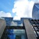 Edificio moderno a vetrate e struttura architettonica per il progetto di Unibuild Consorzio Stabile S.C.AR.L. e sotp web curato da Twister ADV